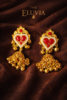 Luxury gold jhumka earrings with red stones and pearl detailing-1